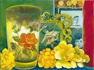 Veladora, fotos y flores